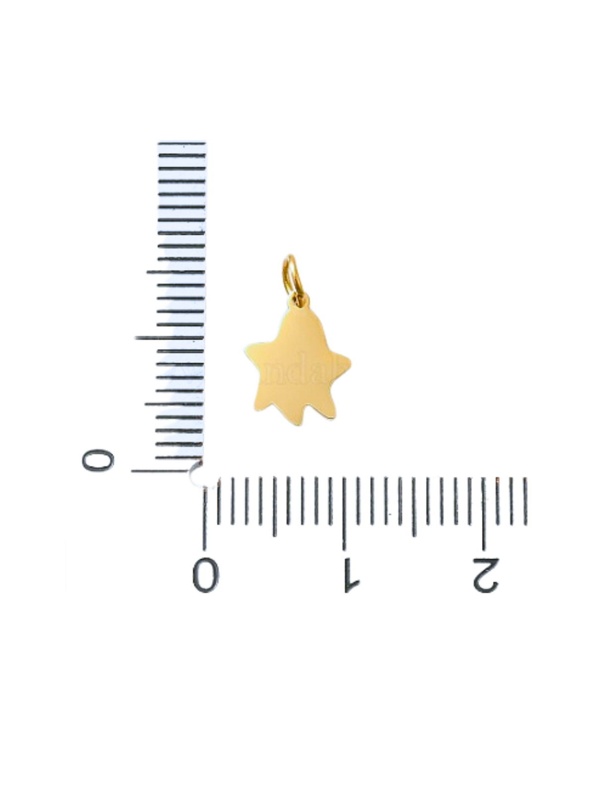 Back of Gold Itty Bitty Ghost Charm next to a ruler