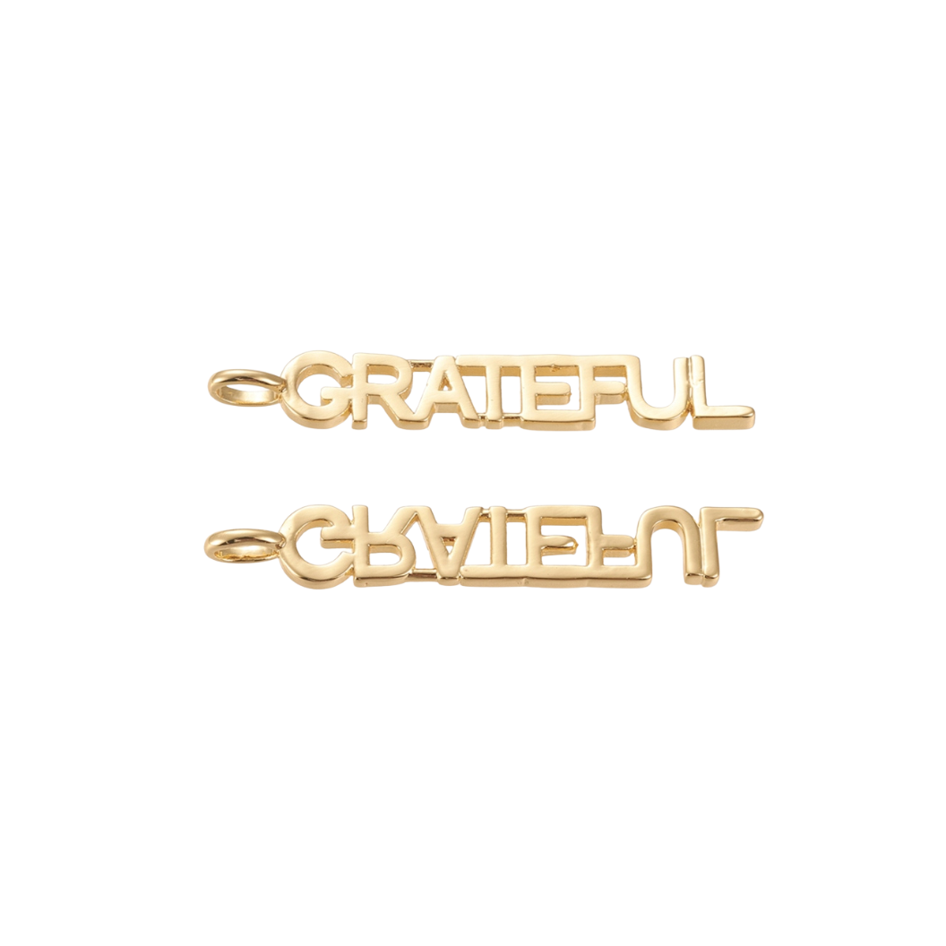 Front & back view of the Gold Grateful Bar Charm