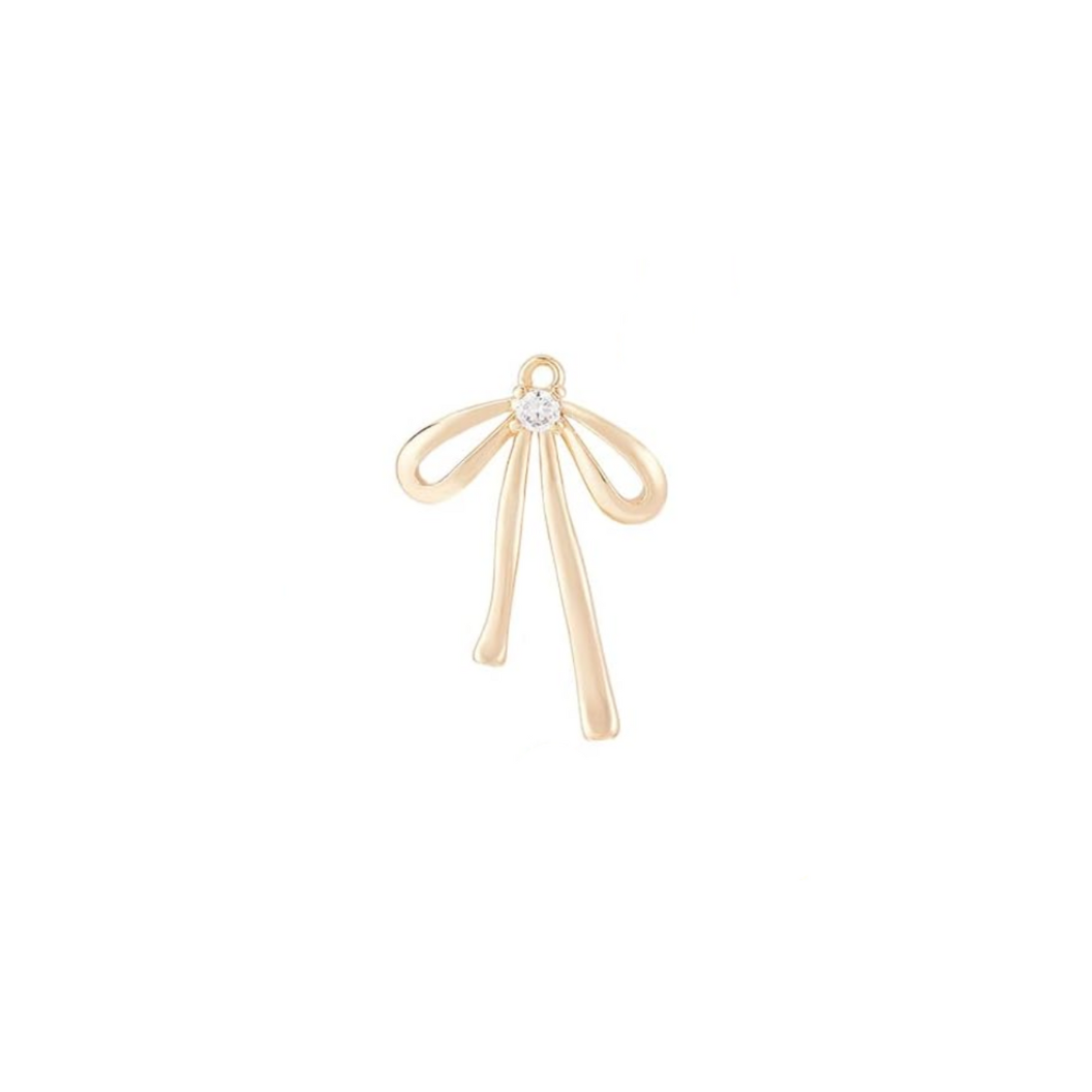 Front of the Gold Coquette Bow Charm