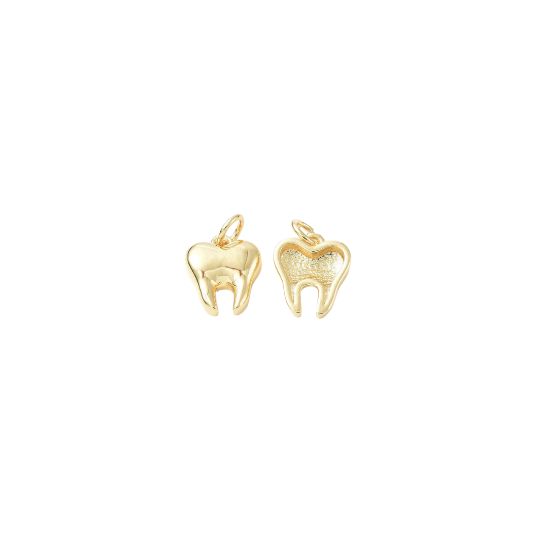 Front and back of Gold Tooth Charm