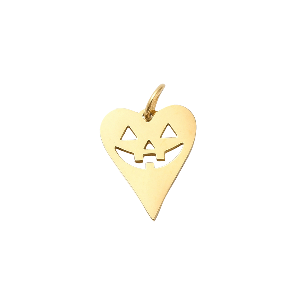 Gold heart-shaped pendant with cut-out design on a white background transparent