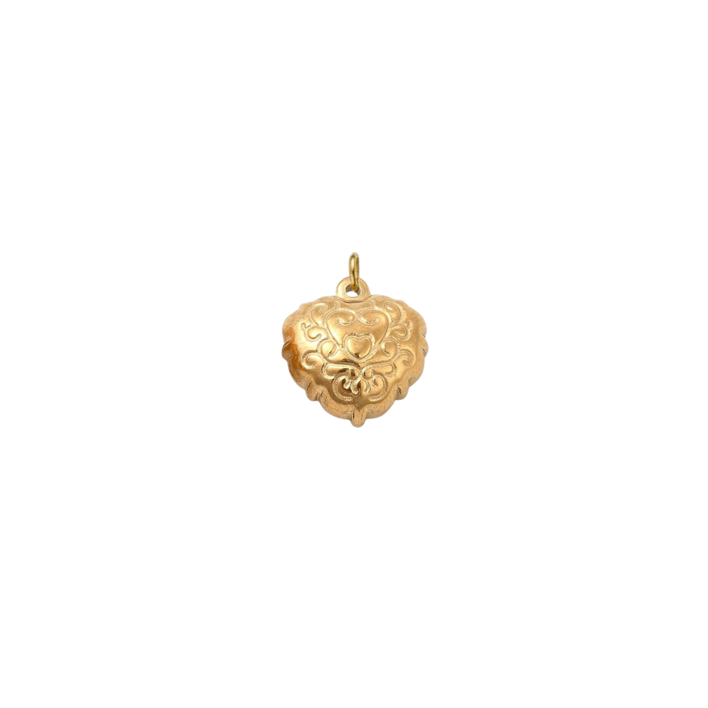 Gold filigree heart charm with an ornate engraved scrollwork design on a transparent background.