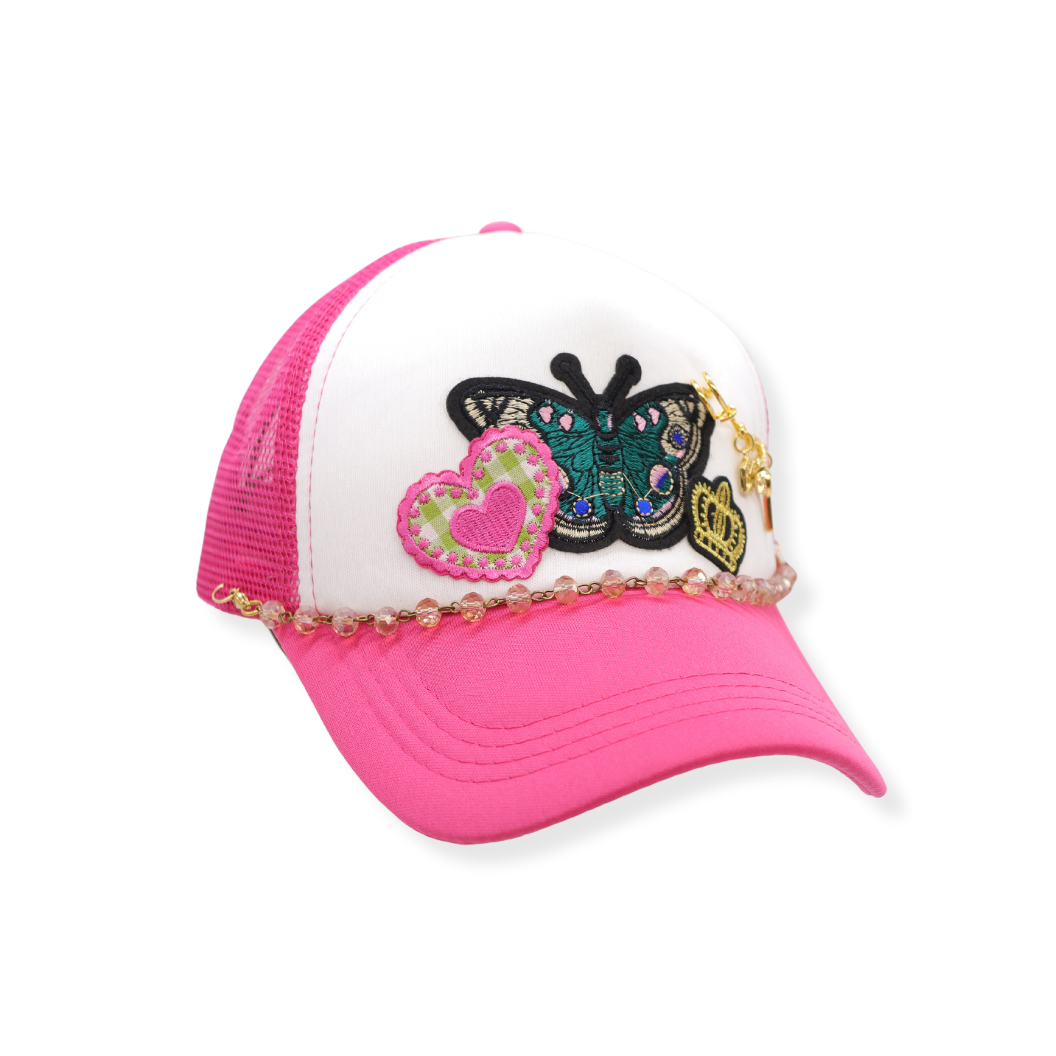 Pink Liza Trucker Hat Chain on a trucker hat
