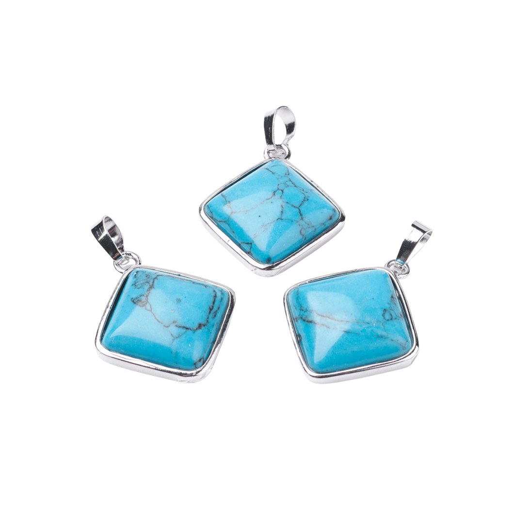 Front view at three of the Silver Turquoise Western Pendant