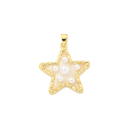 Gold star-shaped pendant with pearls on a white background
