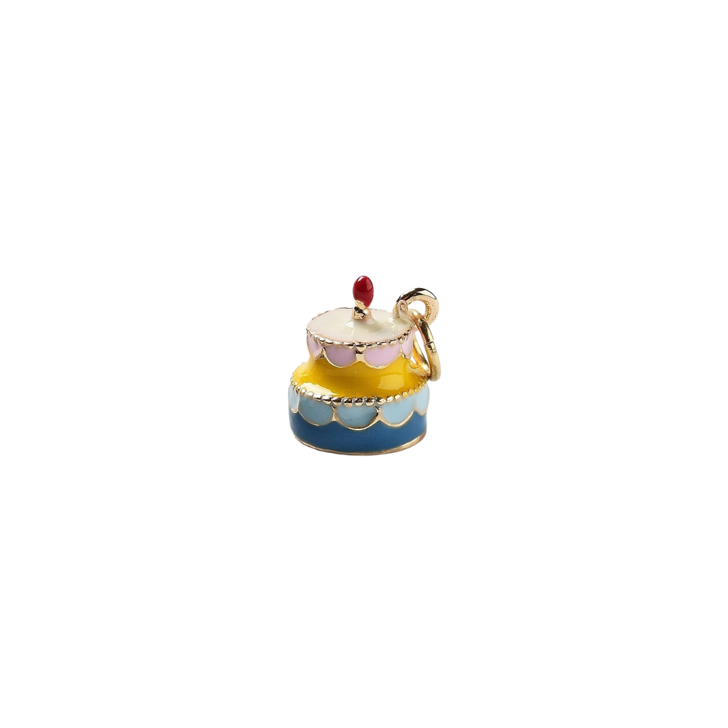 Colorful cake charm on a white background