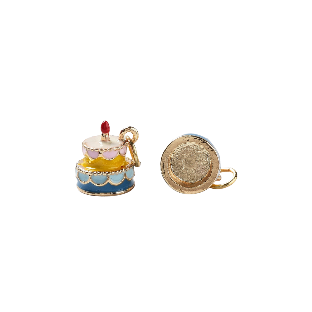 Colorful cake-shaped charm with a red candle on a white background
