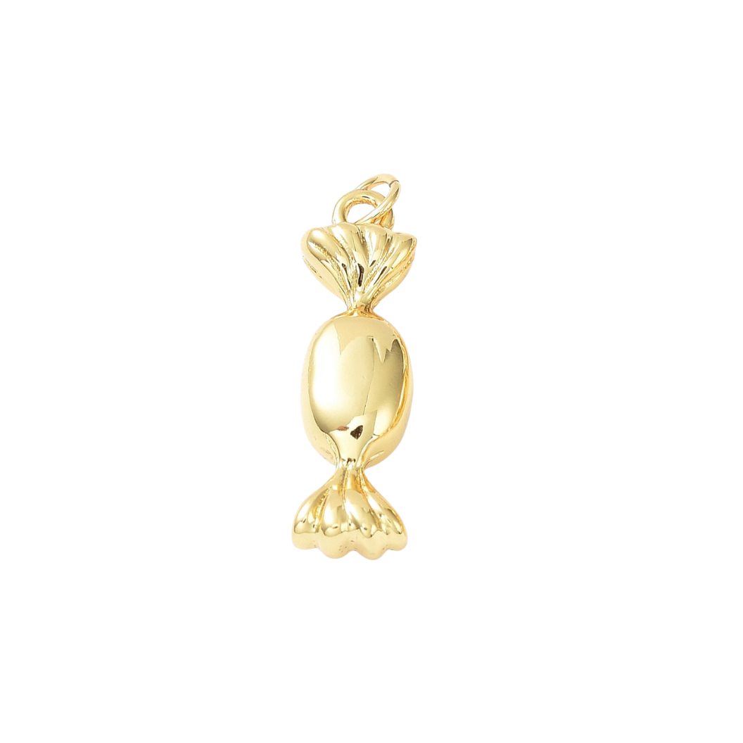white background gold wrapped candy