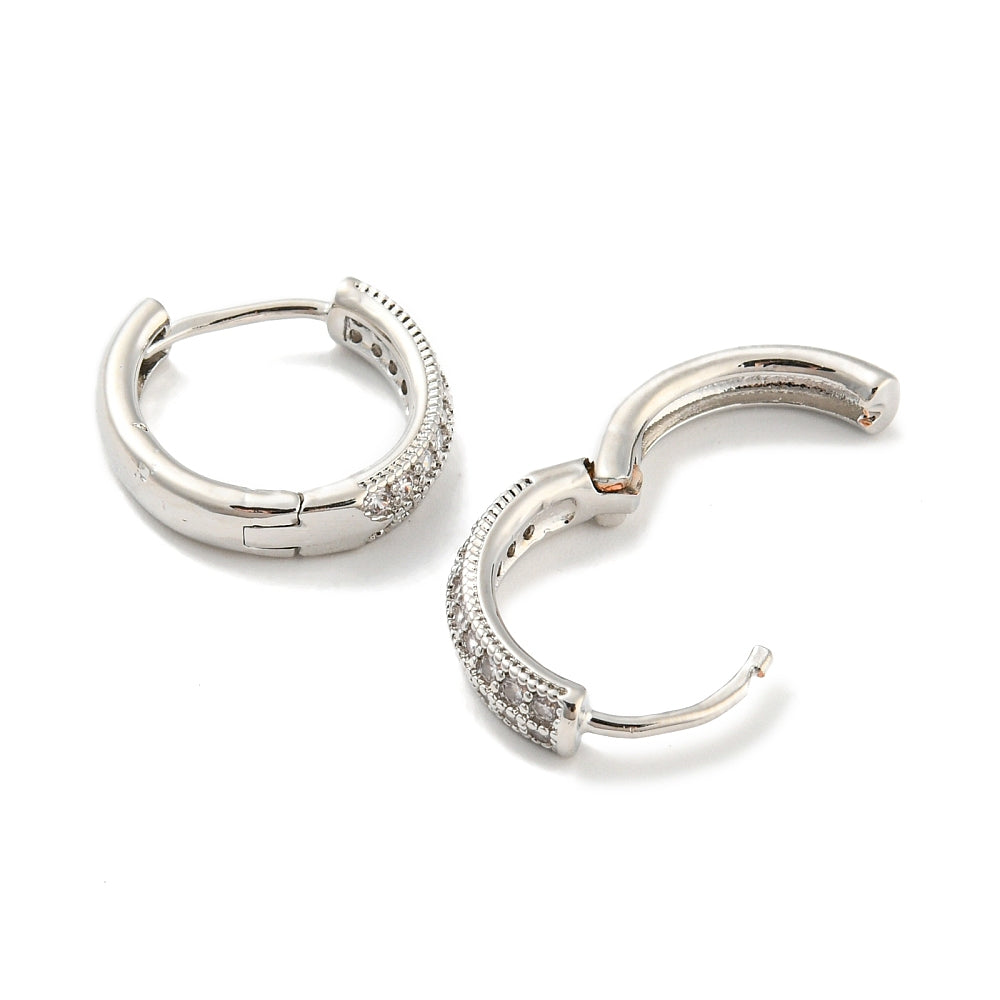 Pair of silver hoop earrings with small diamonds on a white background