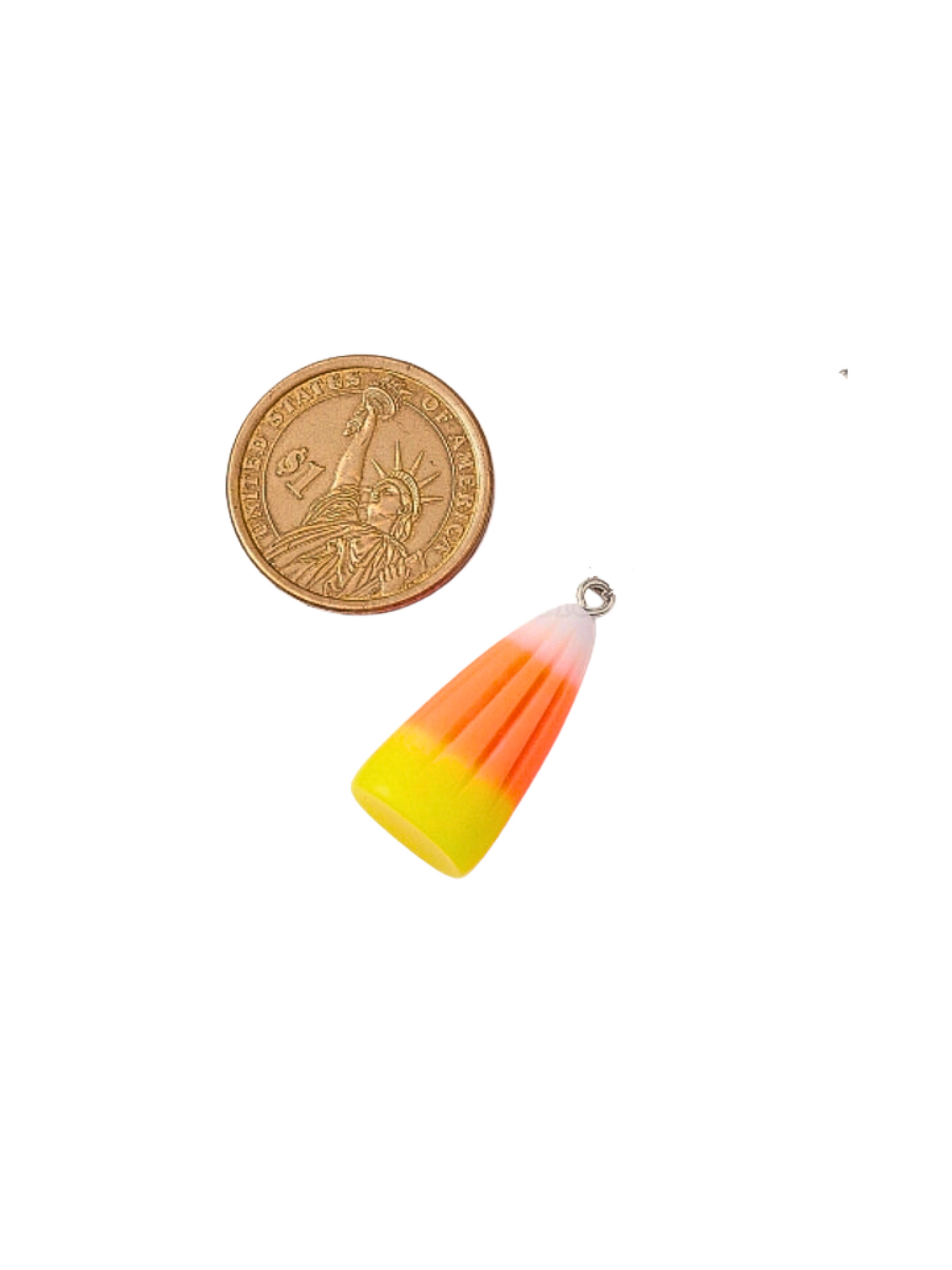 Front of the Candy Corn Lanyard Charm with a $1 coin for size comparison