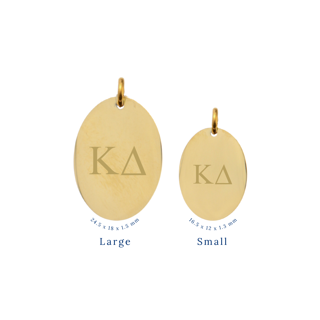 Kappa-delta-gold-large-oval-charm-and-small-oval-charm-comparison-front-horizontal-greek-letters