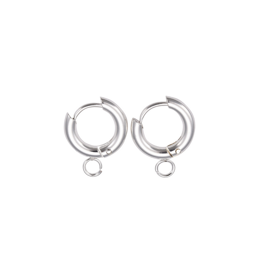 Pair of silver hoop earrings on a white background