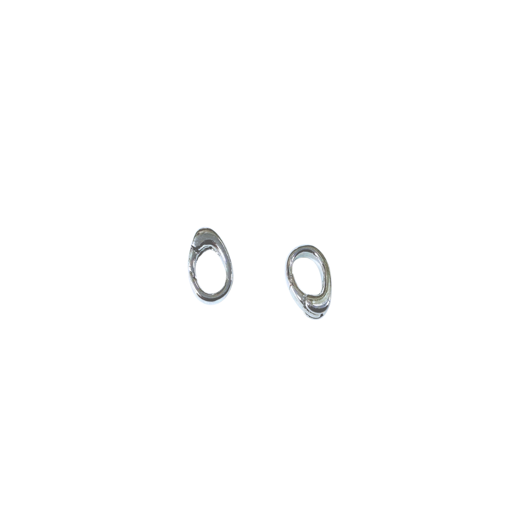Pair of silver hoop earrings on a white background