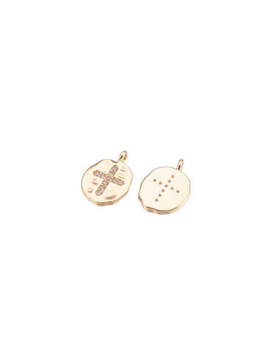 Front and back view of the Hammered Disc Embellished Cross Charm in gold.