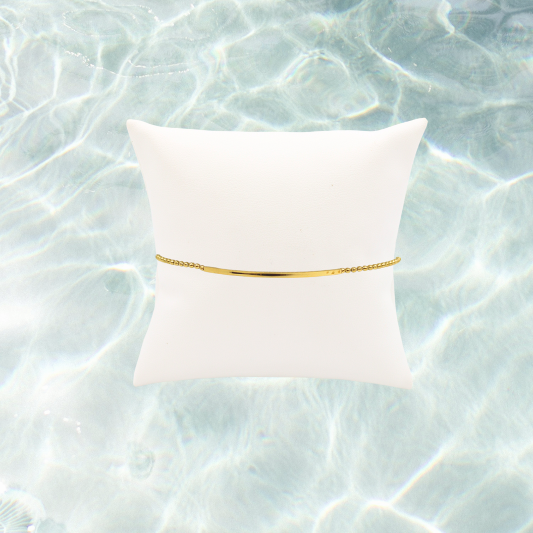 Gold Chain Anklet | Waterproof, Hypoallergenic & Tarnish Resistant on water background