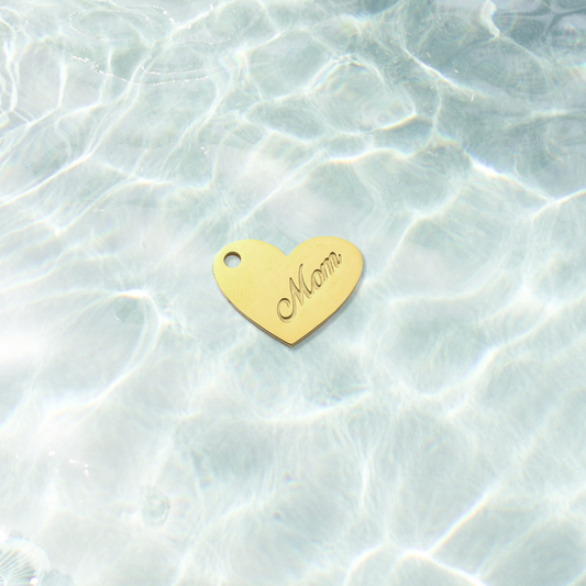 Gold Classic Mom Keepsake Heart Charm on water background 