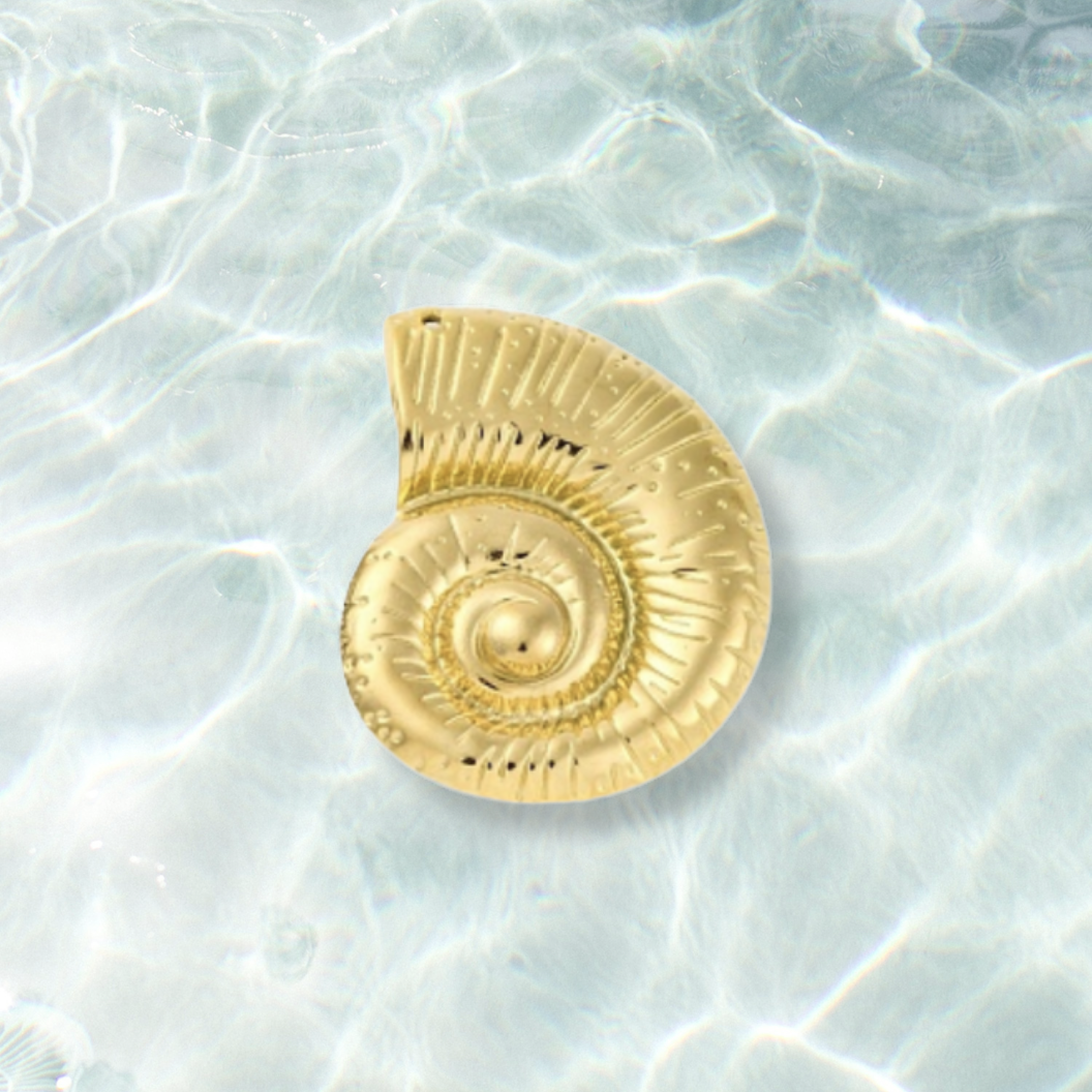 Gold Oceanic Conch Charm on water background