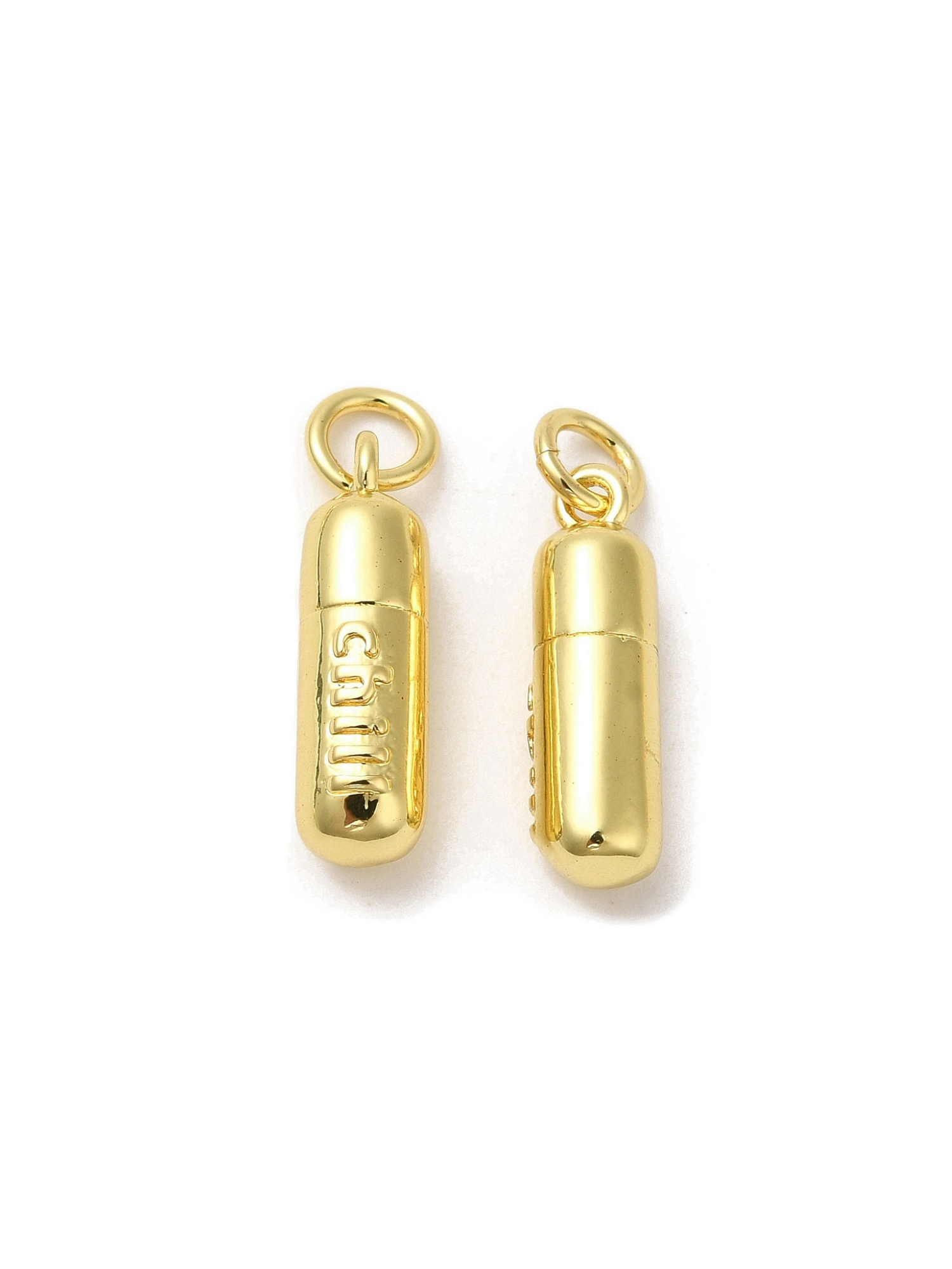 Two Chill Pill Charms on white background, one front view, one back view.