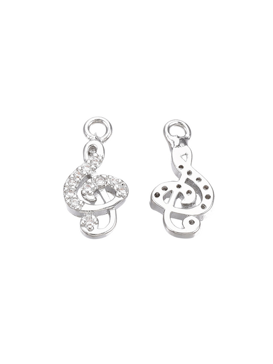 Treble Clef Charm on white background, front and back view.