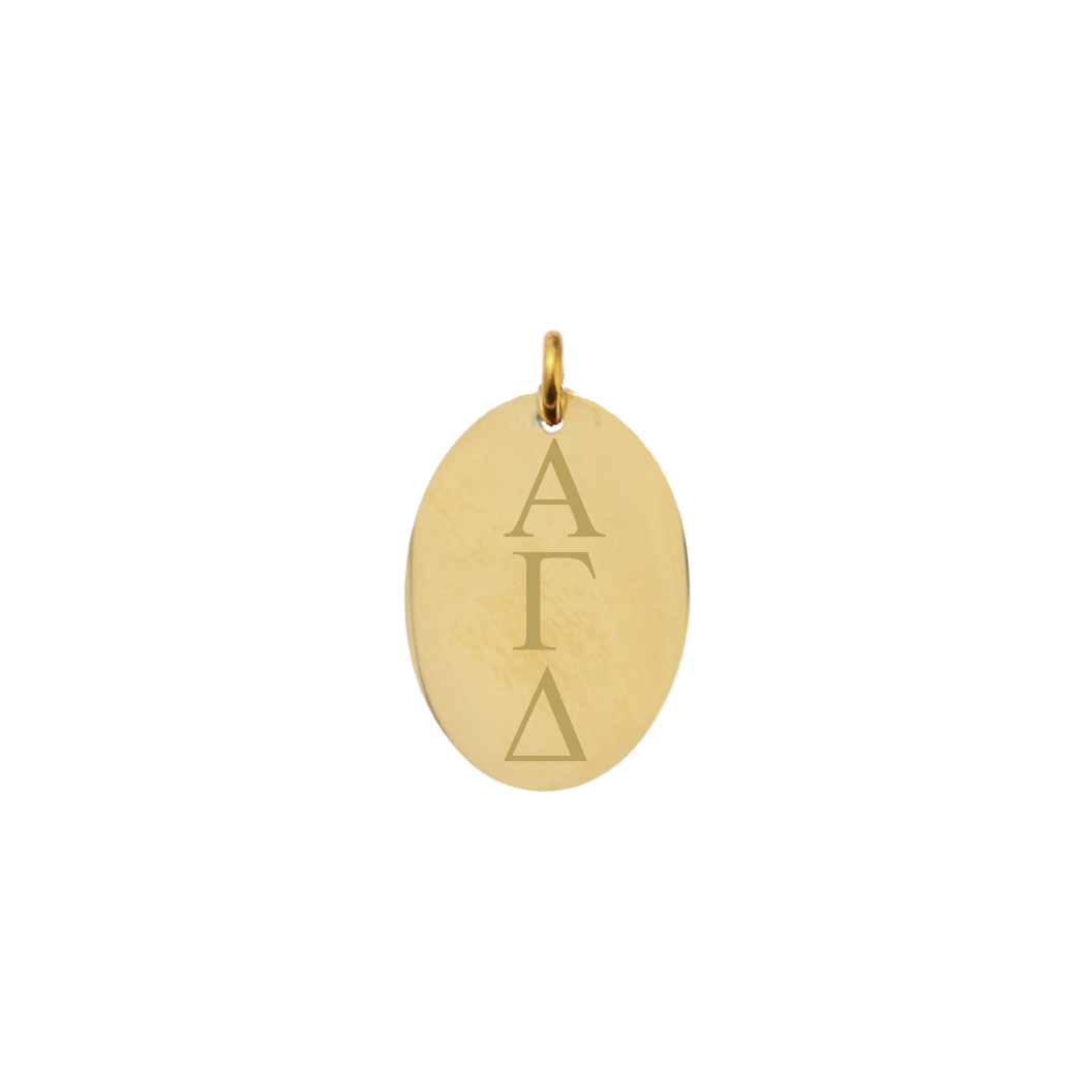 Alpha Gamma Delta gold large oval charm with vertical/stacked greek letters front view