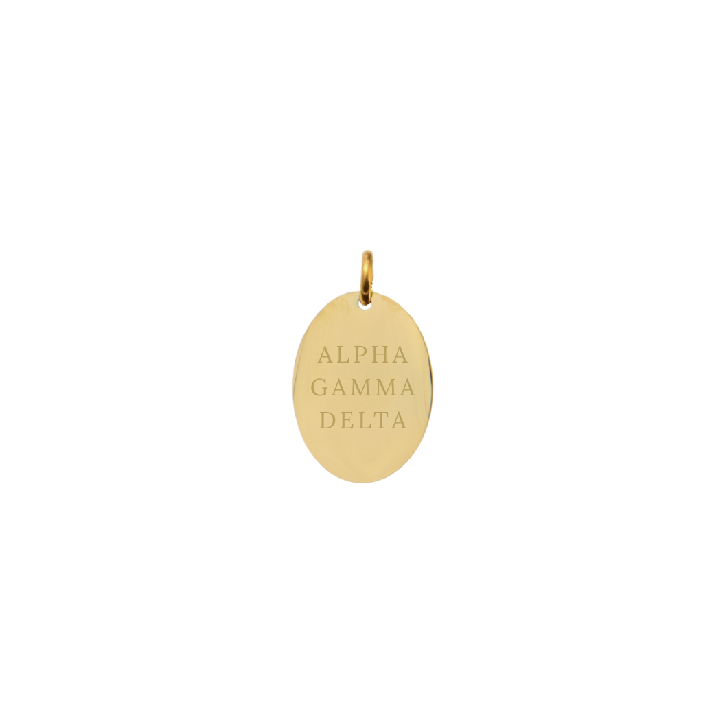 Alpha Gamma Delta gold small oval charm with full sorority name front view