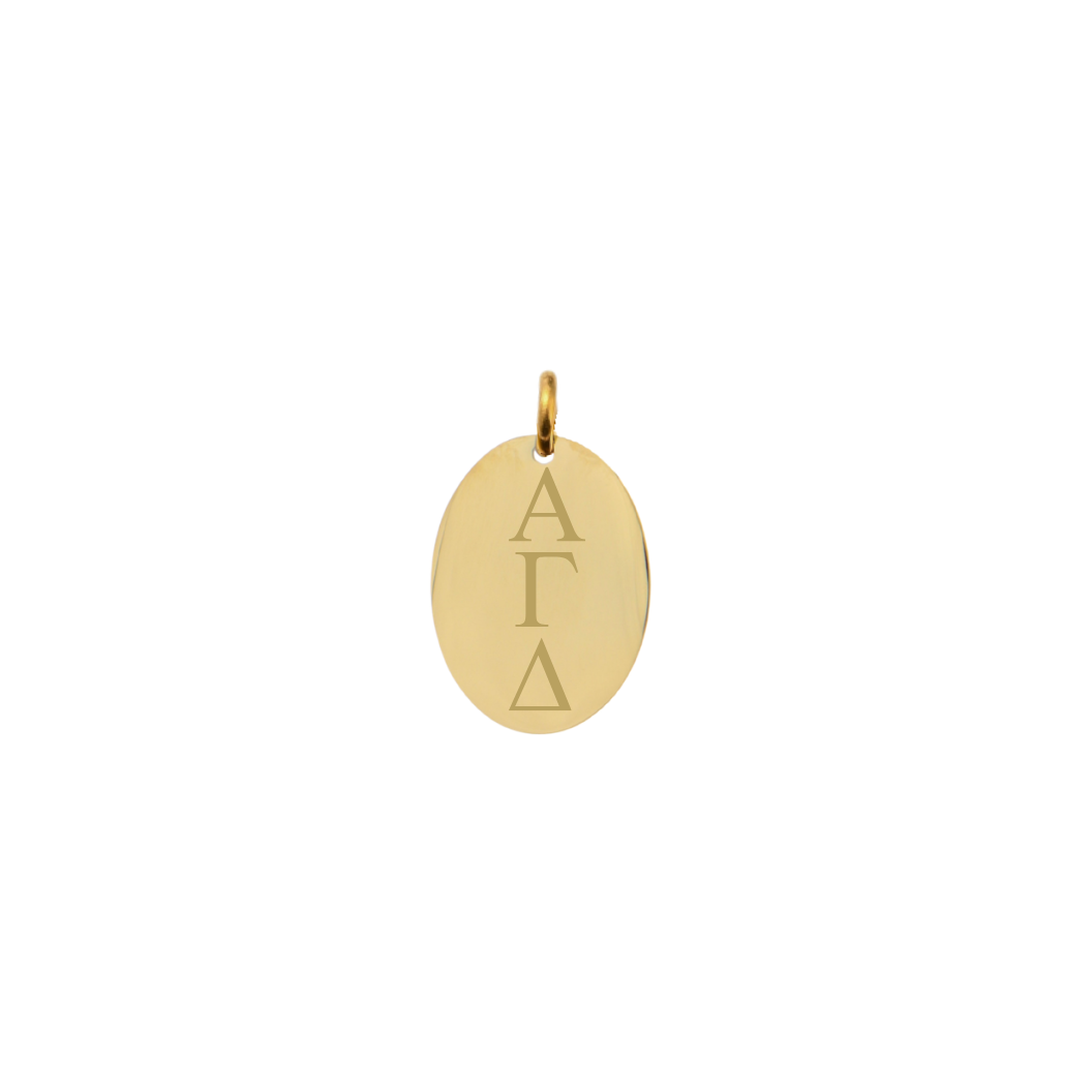 Alpha Gamma Delta gold small oval charm with vertical/stacked greek letters front view
