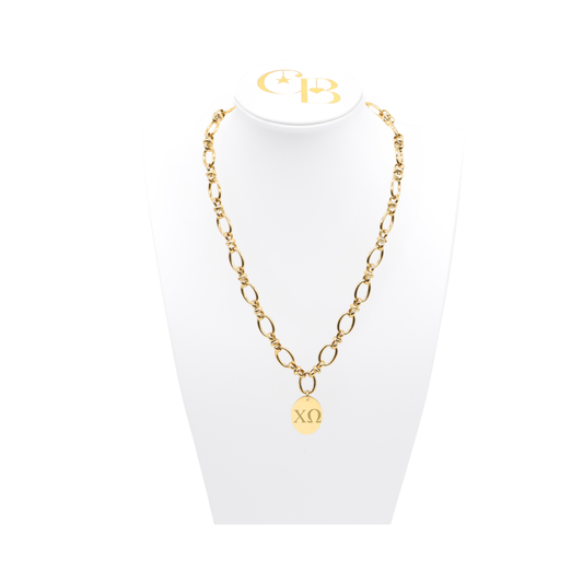 Chi Omega gold large link evermore necklace with large oval charm with horizontal greek letters on white necklace bust front