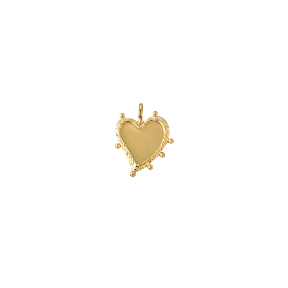Gold heart-shaped charm featuring a smooth polished center with an organic textured border and decorative bead accents, displayed on a white background.