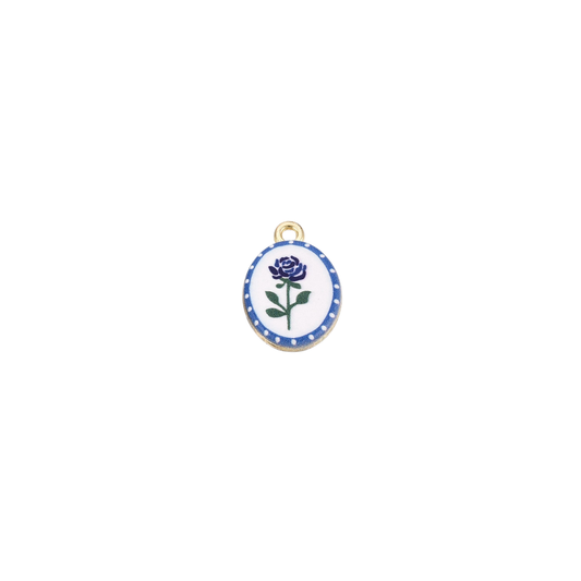 Gold oval charm featuring a blue rose floral design with a blue dotted border on a white background