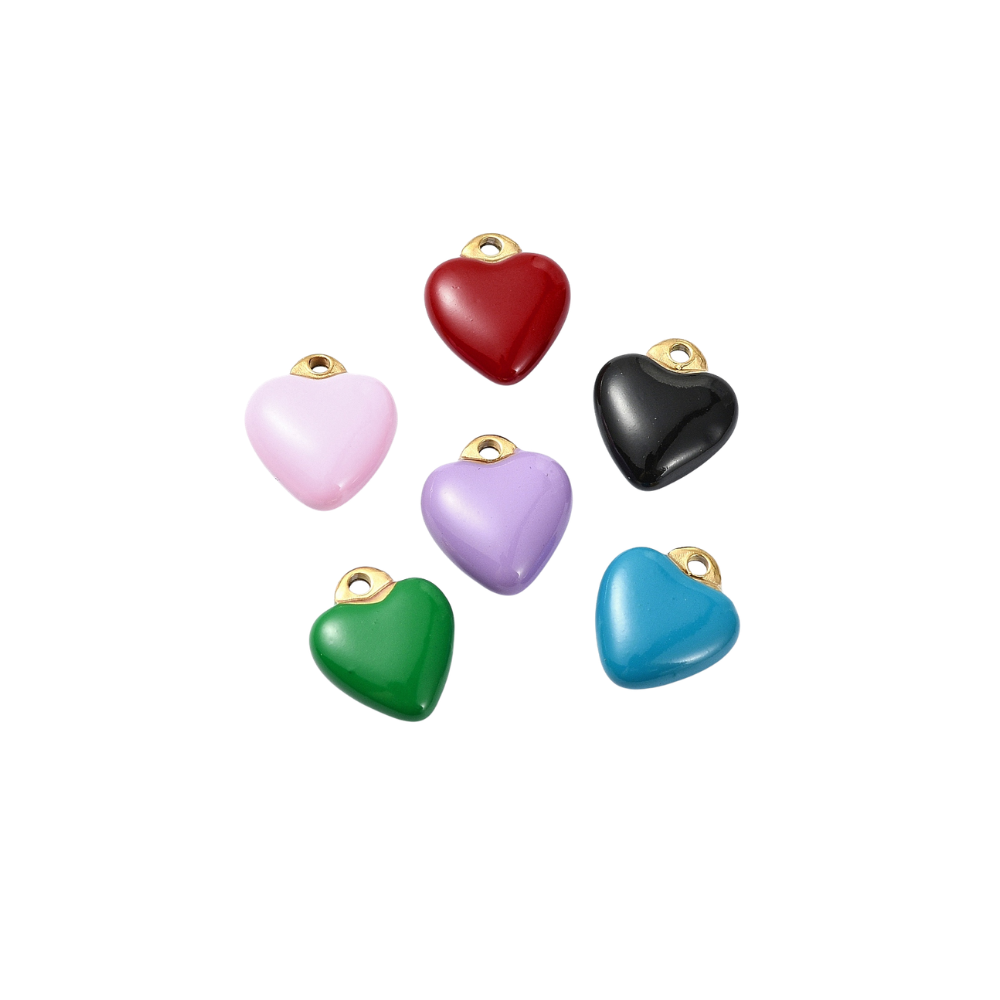 Gold colorful heart charms with assorted colors on white background
