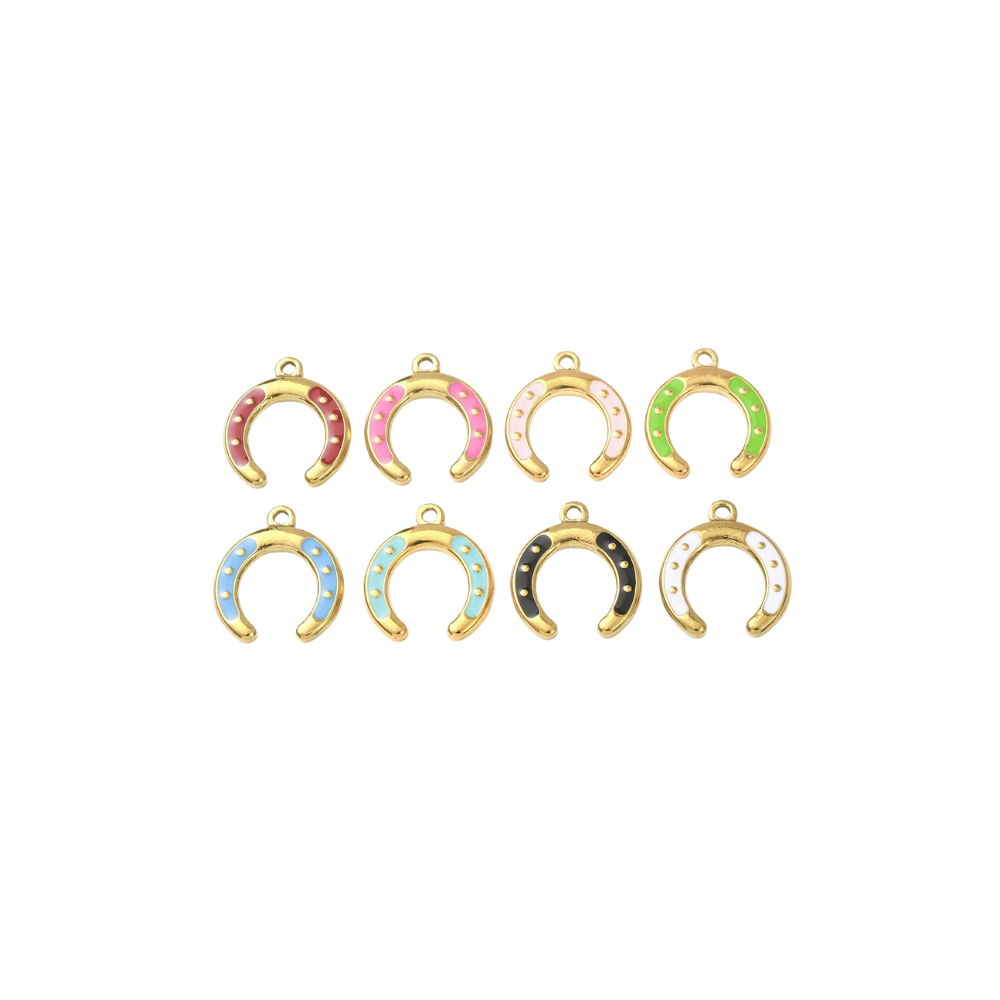 Assorted gold horseshoe charms with colorful enamel accents on a white background