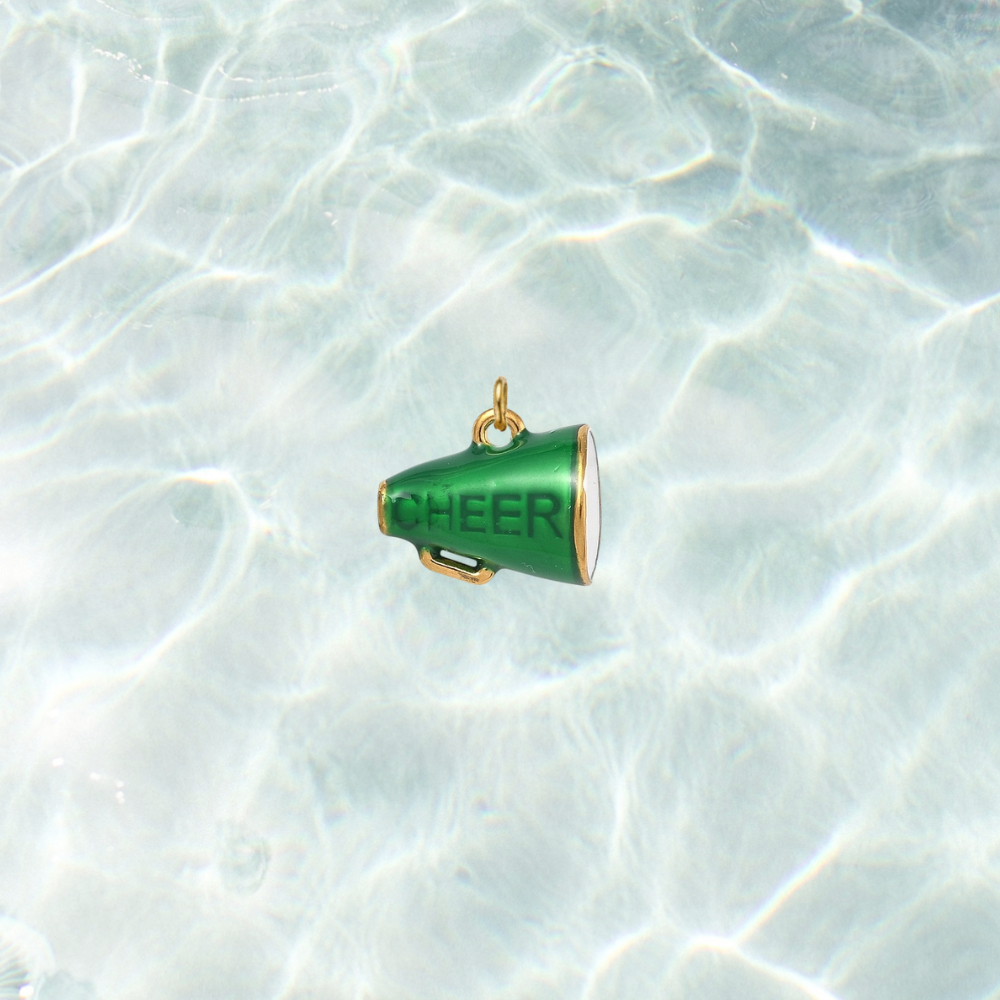 Gold green megaphone charm featuring the word "CHEER" in bold lettering on a shimmering water background.