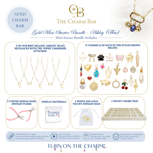 The Charm Bar Gold Mini Starter Bundle – Ashley (Flat) includes 5 Ashley Flat necklaces with Piper carabiners, 72 assorted gold charms, jewelry pliers, display signage, 5 white and gold velvet jewelry bags, and a velvet charm tray for creating custom charm necklaces in boutiques, pop-up shops, and events.