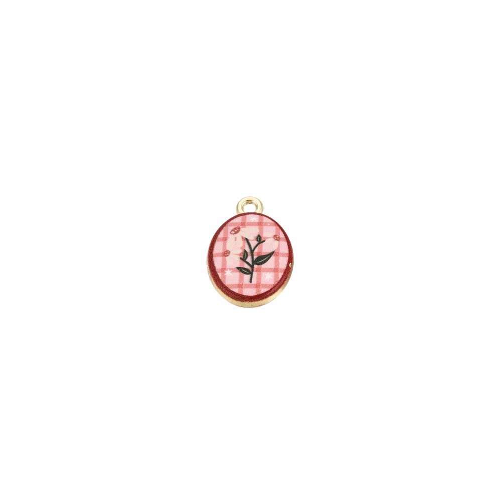 Gold pink checkered floral oval charm featuring a delicate white flower design on a pink gingham background