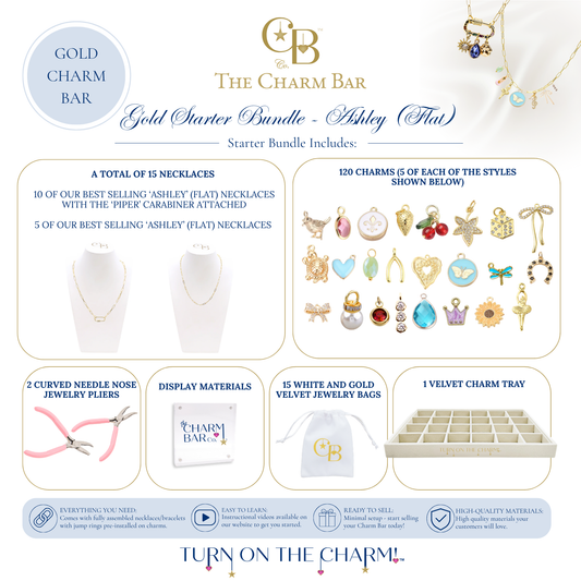 The Charm Bar Gold Starter Bundle – Ashley (Flat) includes 15 Ashley Flat gold necklaces, 120 assorted gold charms, jewelry pliers, display signage, 15 velvet jewelry bags, and a velvet charm tray for creating custom charm necklaces in boutiques, pop-up shops, and events.