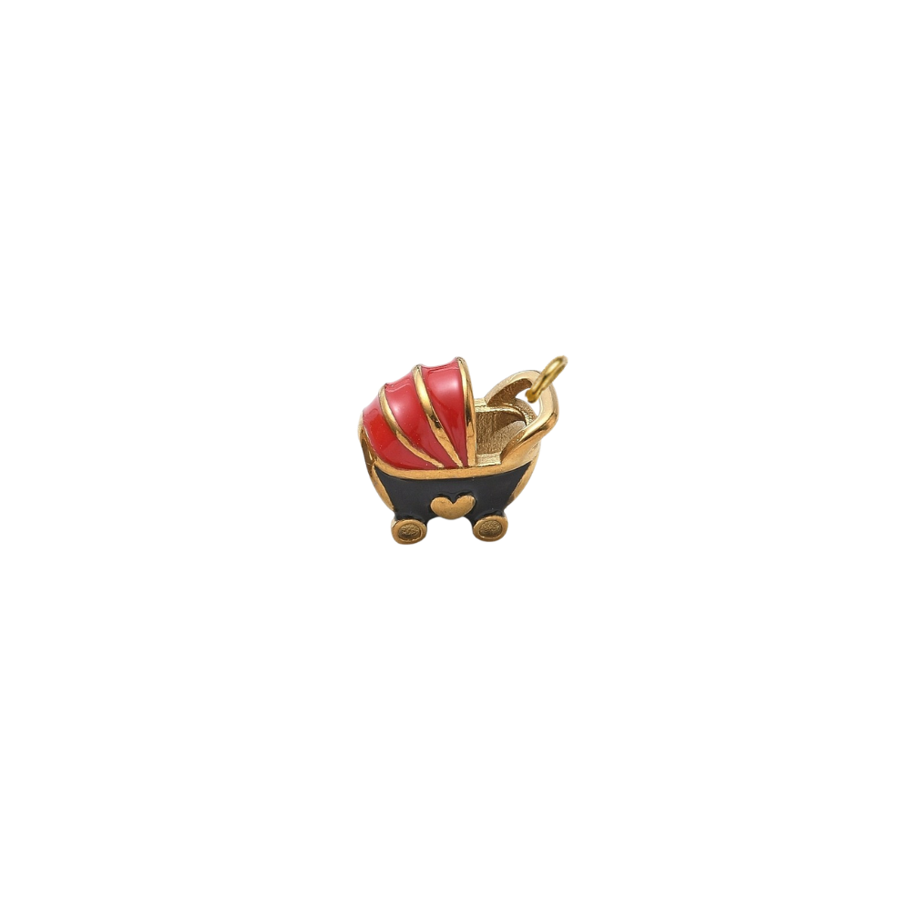 Gold vintage baby carriage charm featuring a red and black enamel baby stroller with gold accents on a white background.