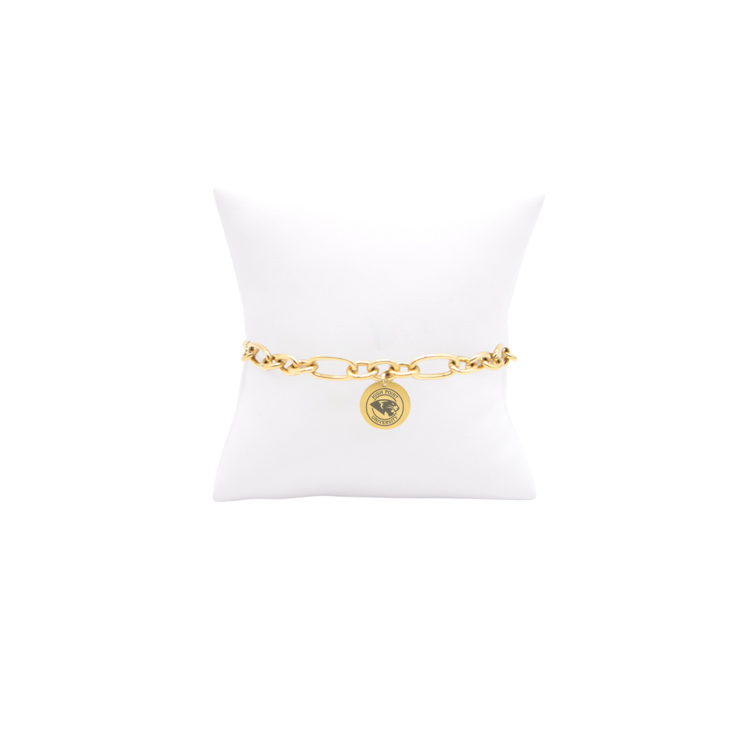 High Point University gold large link Keepsake bracelet with large round charm with high point university text and panther logo on white pillow front view
