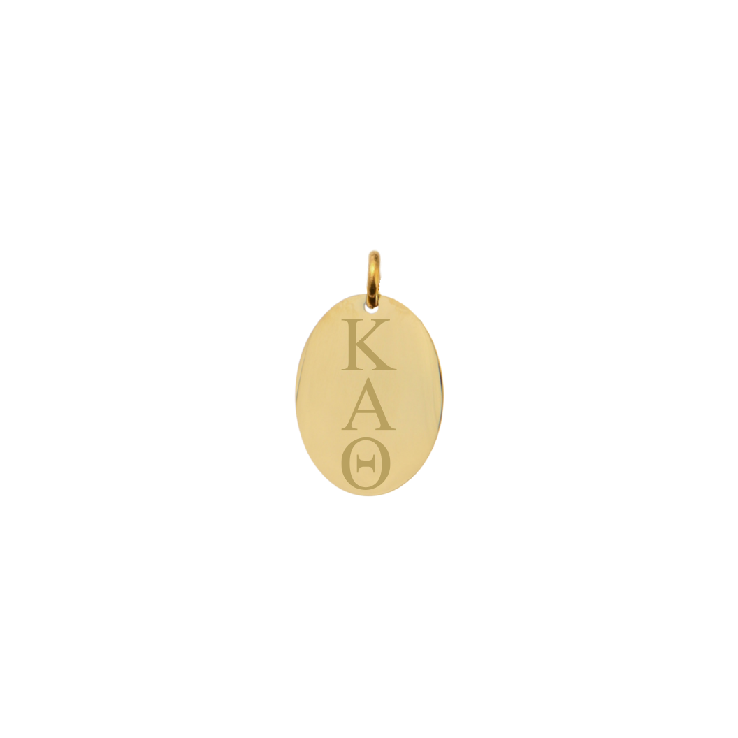 Kappa Alpha Theta gold small oval charm with vertical/stacked greek letters front view