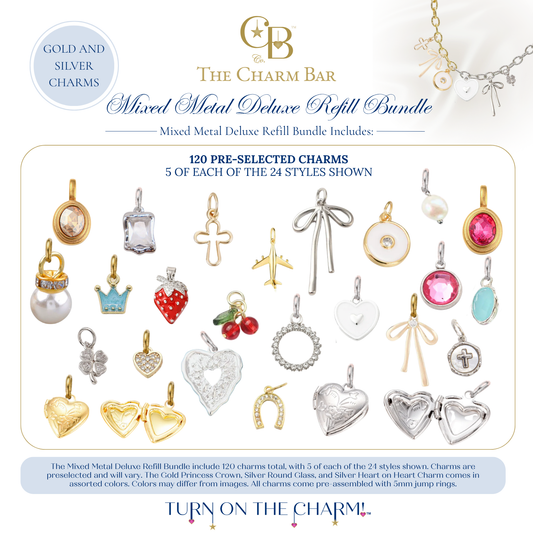 The Charm Bar Mixed Metal Deluxe Refill Bundle featuring 120 pre-selected interchangeable charms in gold and silver finishes, including crosses, bows, airplanes, gemstones, pearls, cherries, strawberries, hearts, lockets, horseshoes, crowns, and everyday designs for creating custom charm necklaces and bracelets.