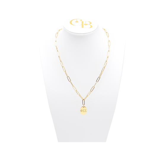 Phi Sigma Sigma gold link storyline necklace with small oval charm displayed on white necklace bust front view with horizontal greek letters
