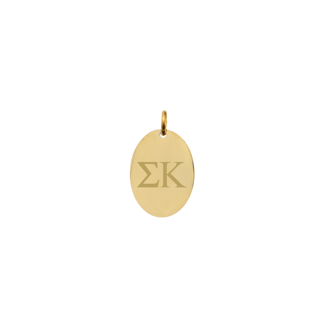 Sigma Kappa gold large oval charm with horizontal greek letters front view