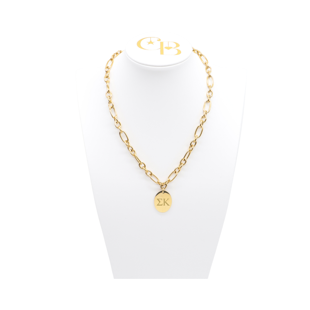 Sigma Kappa gold large link Keepsake Necklace with large oval charm with horizontal greek letters on white bust front view