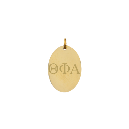 Theta Phi Alpha gold large oval charm with horizontal greek letters front view